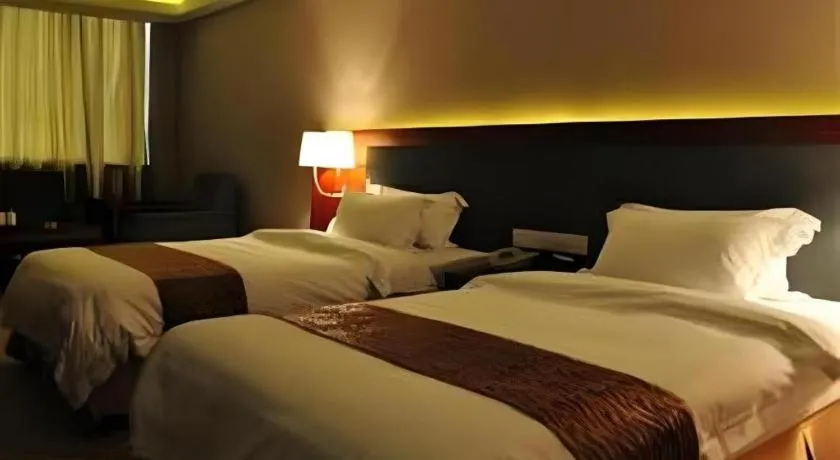 Bed in Guangna Hotel