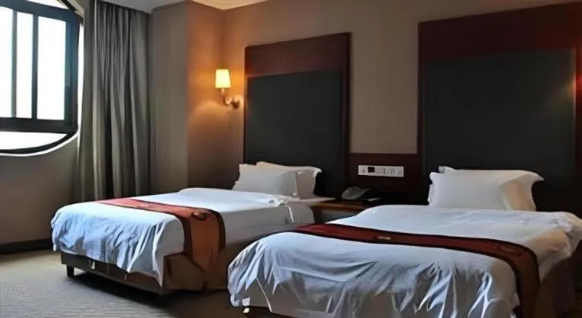 Bed in Guangna Hotel