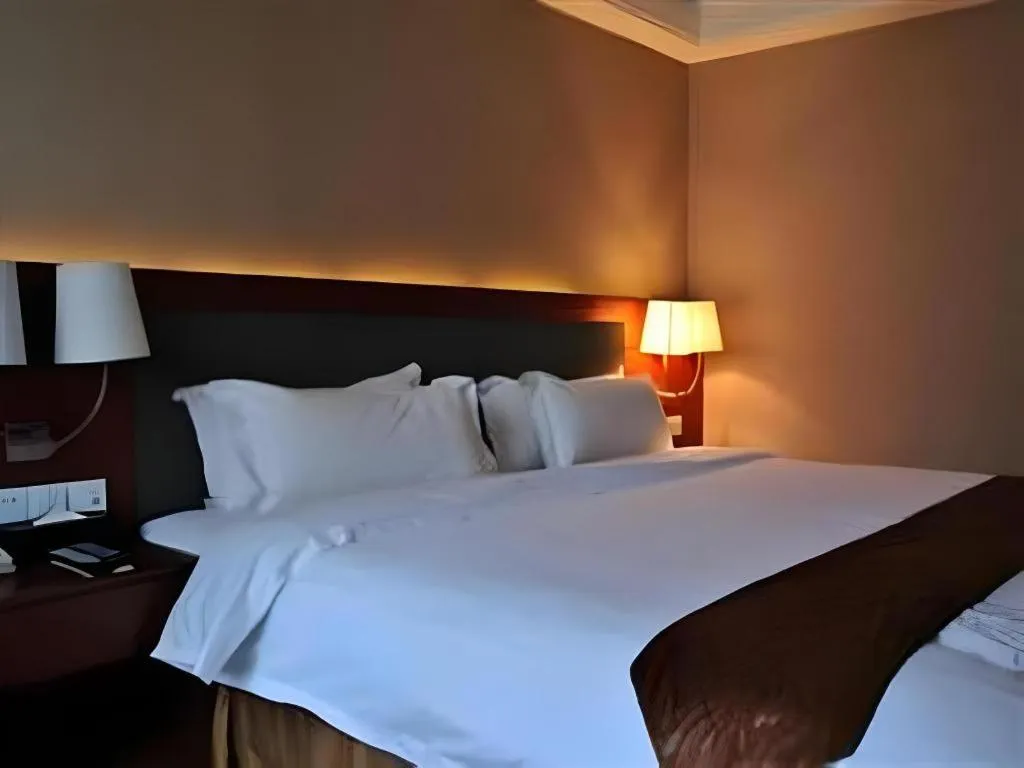 Bed in Guangna Hotel