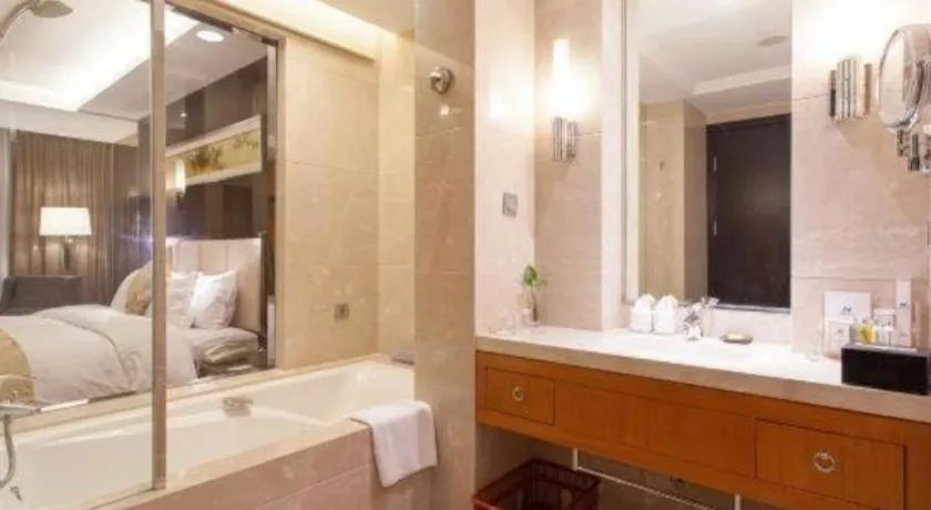 Bed in Qingdao Haidu Hotel