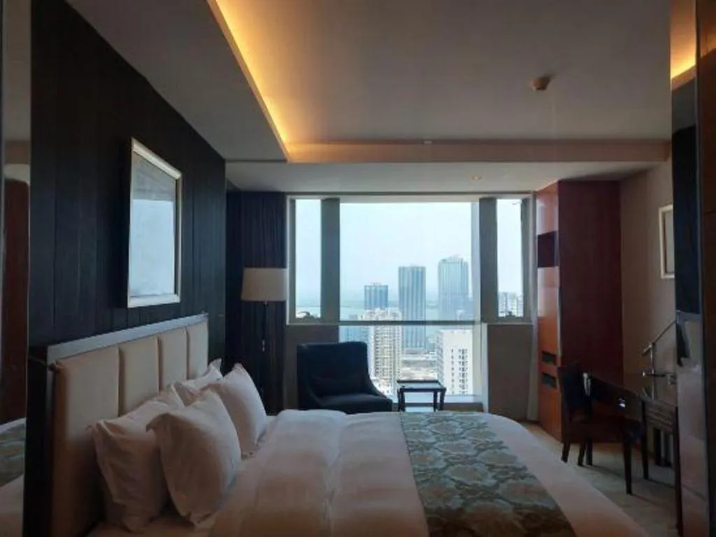 Bed in Qingdao Haidu Hotel