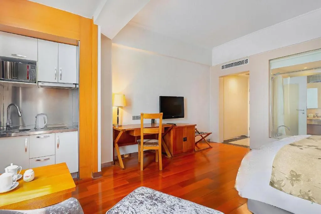 Bed in Qingdao Haidu Hotel