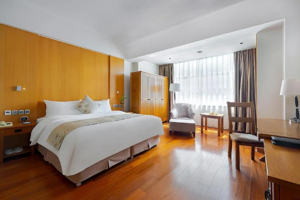 Bed in Qingdao Haidu Hotel