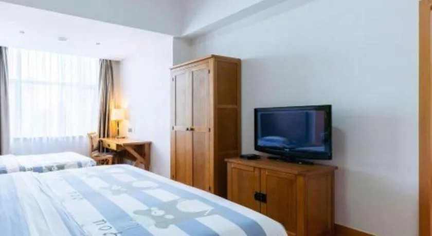 Bed in Qingdao Haidu Hotel