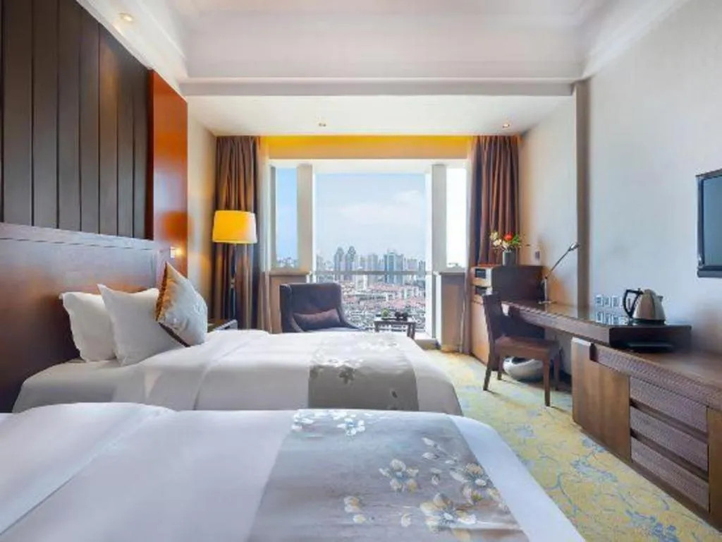 Bed in Qingdao Haidu Hotel