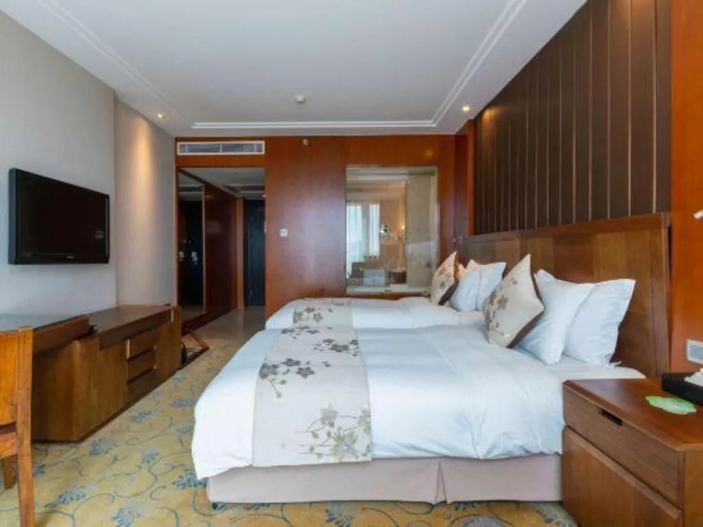 Bed in Qingdao Haidu Hotel