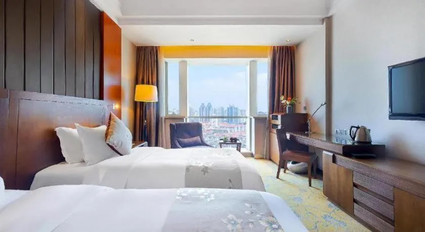 Bed in Qingdao Haidu Hotel