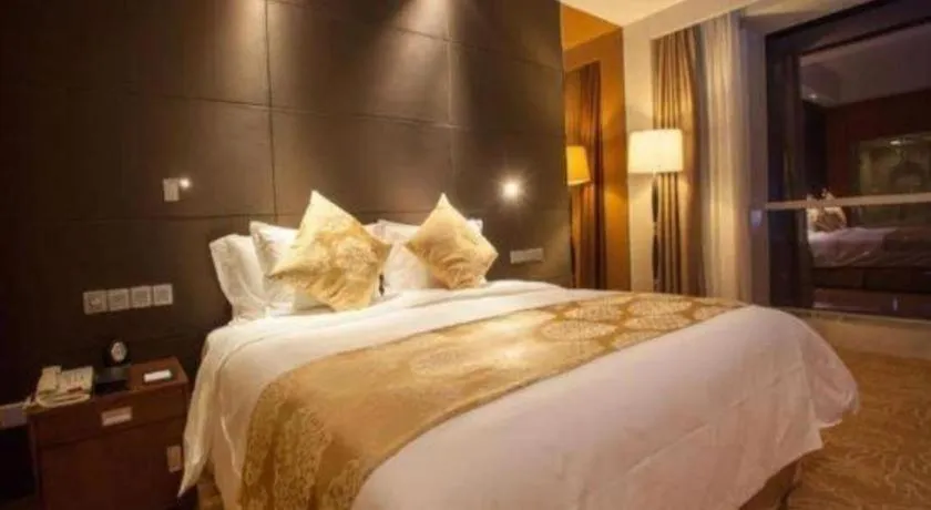 Bed in Qingdao Haidu Hotel