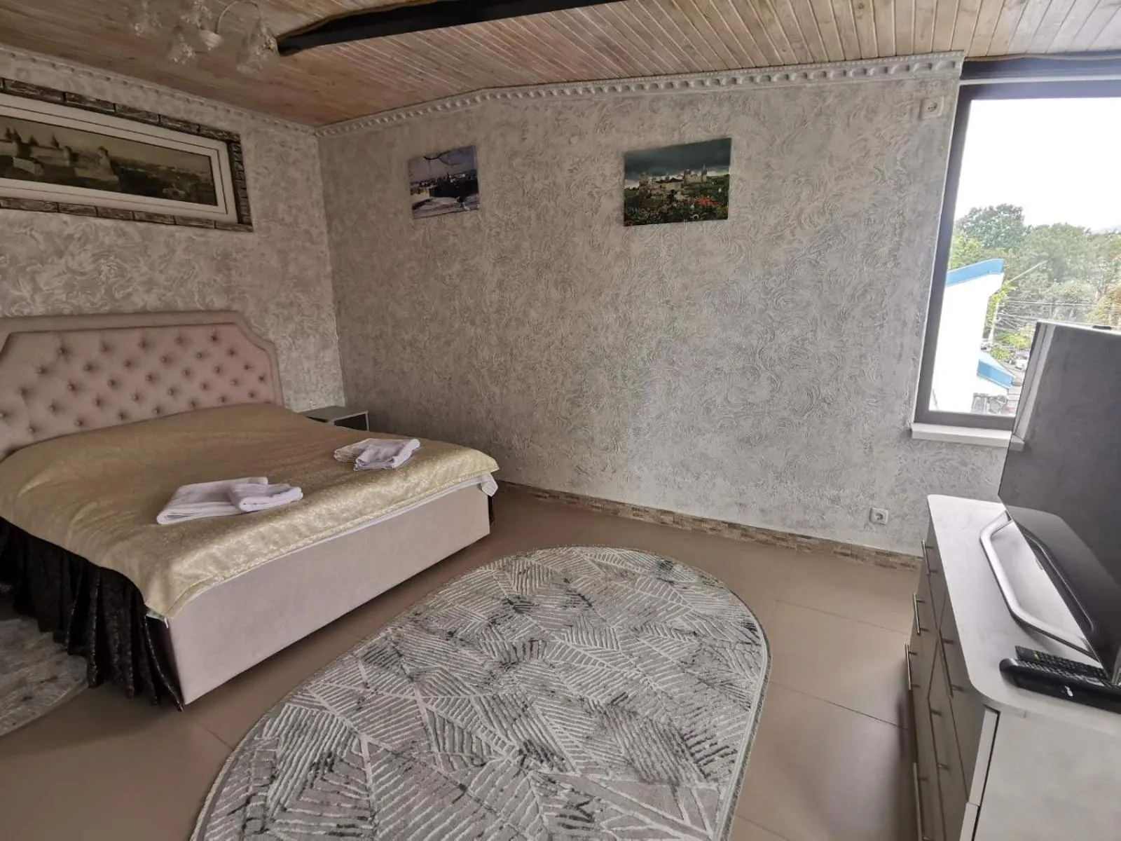 Bed in Monte-Kristo Hotel