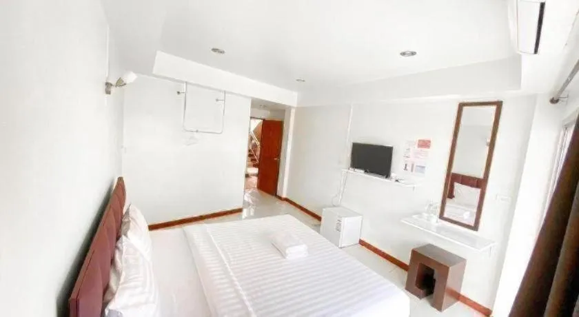 Bed in Baan Rim Khong Hotel