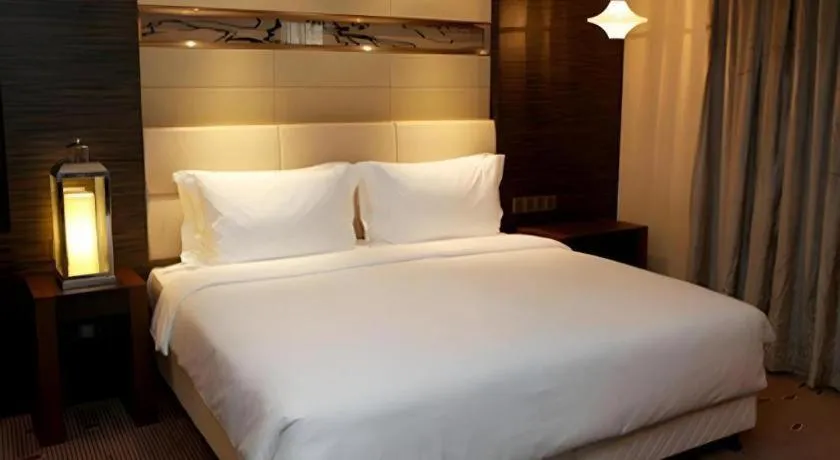 Bed in Grand Metropark Hotel Qingdao