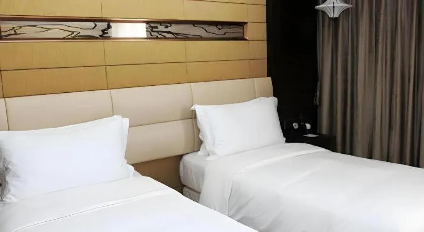 Bed in Grand Metropark Hotel Qingdao
