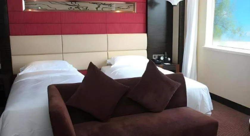 Bed in Grand Metropark Hotel Qingdao