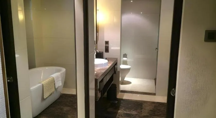 Bed in Grand Metropark Hotel Qingdao