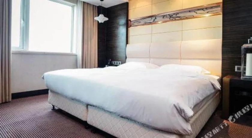 Bed in Grand Metropark Hotel Qingdao
