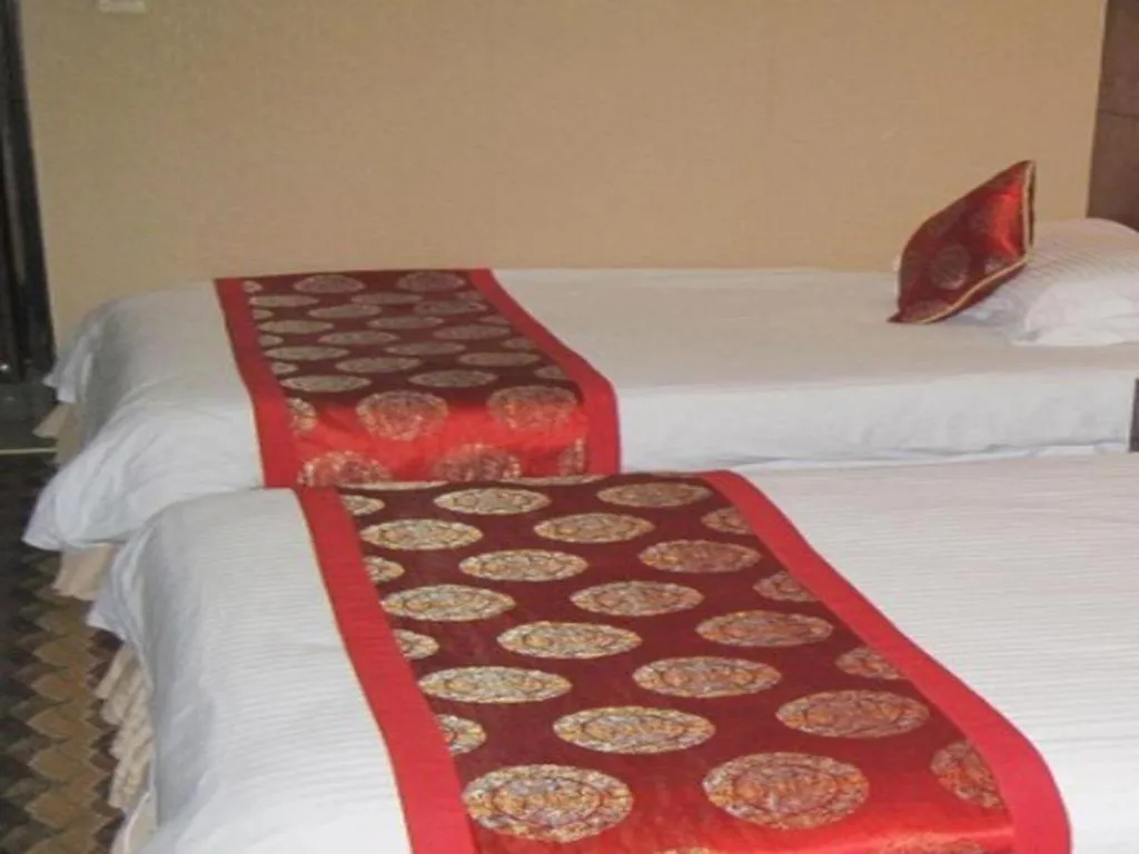 Bed in Yiwu Guomao Hotel