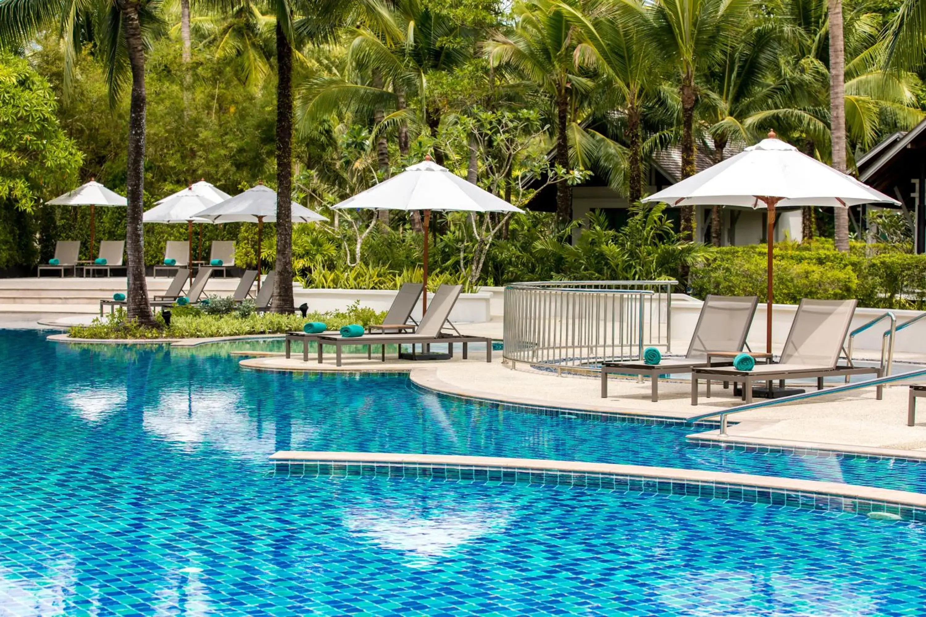 Swimming pool in OUTRIGGER Khao Lak Beach Resort - SHA Extra Plus Swimming pool in OUTRIGGER Khao Lak Beach Resort - SHA Extra Plus