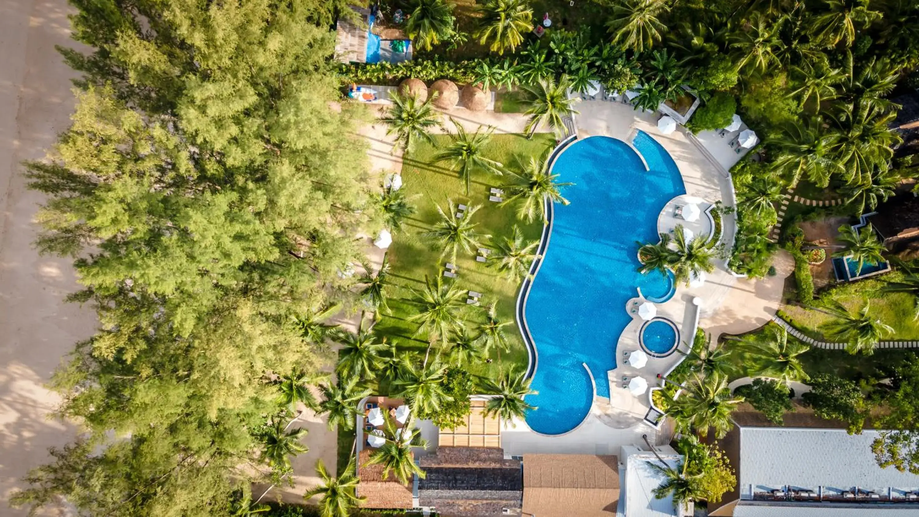 Swimming pool in OUTRIGGER Khao Lak Beach Resort - SHA Extra Plus Swimming pool in OUTRIGGER Khao Lak Beach Resort - SHA Extra Plus