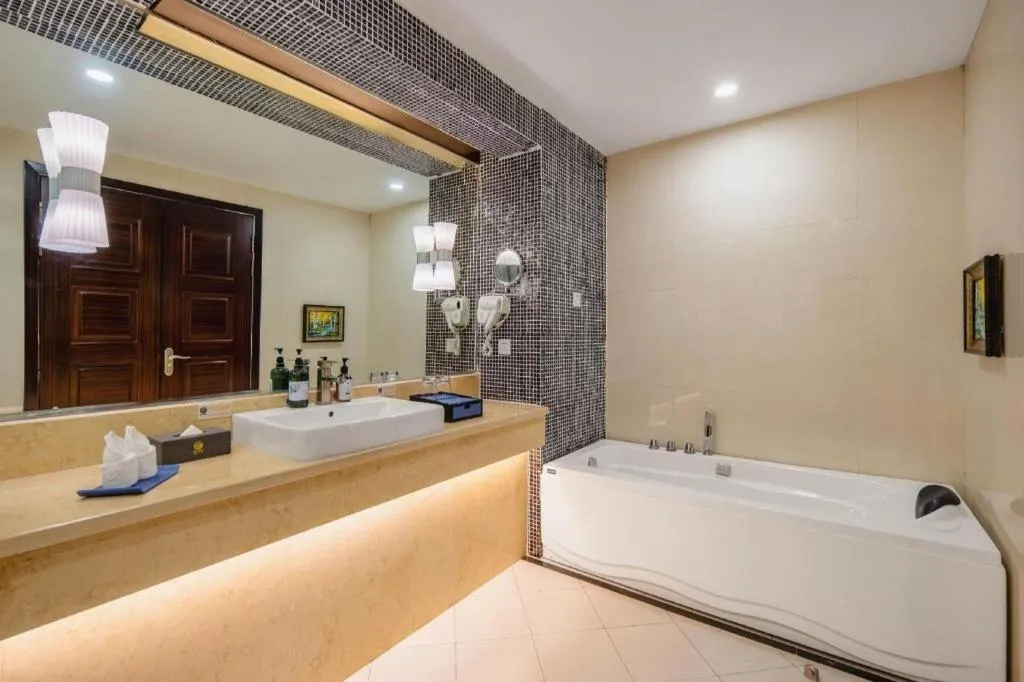 Bed in Aksu Pudong Holiday Hotel