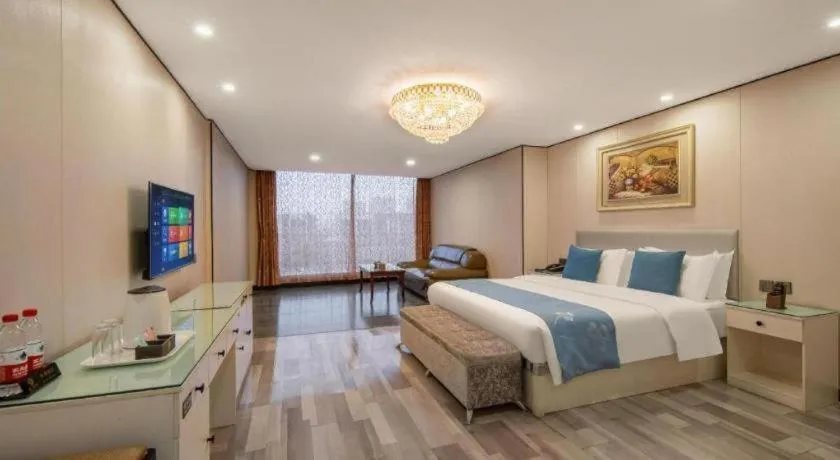 Bed in Aksu Pudong Holiday Hotel