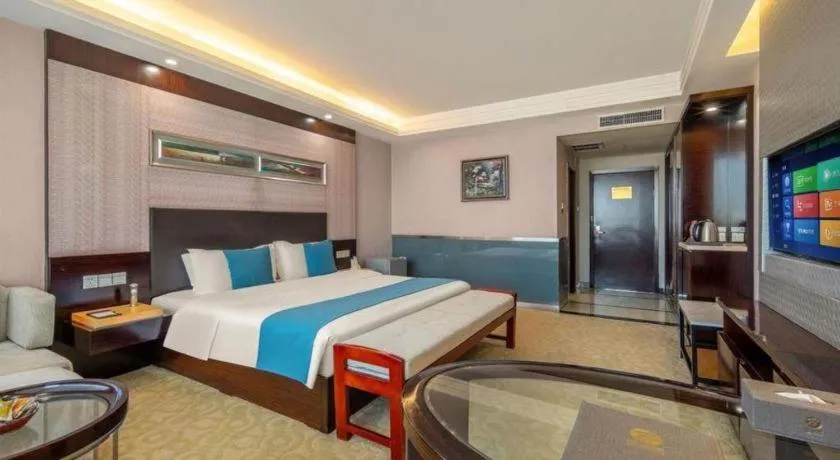 Bed in Aksu Pudong Holiday Hotel