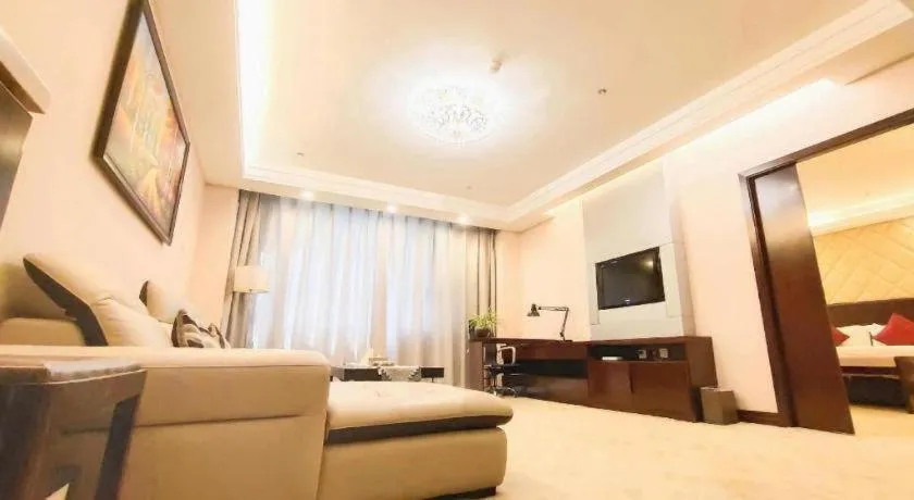 Bed in Aksu Pudong Holiday Hotel