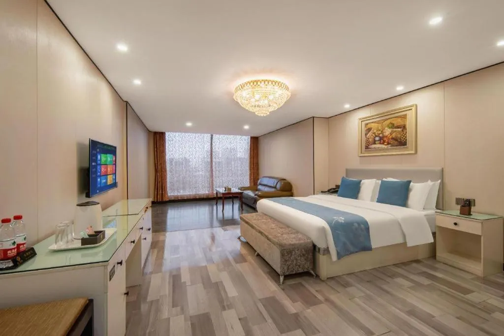 Bed in Aksu Pudong Holiday Hotel