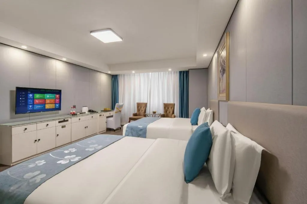 Bed in Aksu Pudong Holiday Hotel