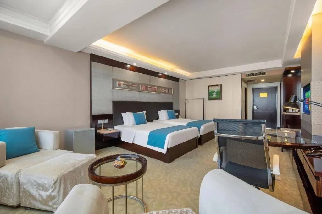 Bed in Aksu Pudong Holiday Hotel