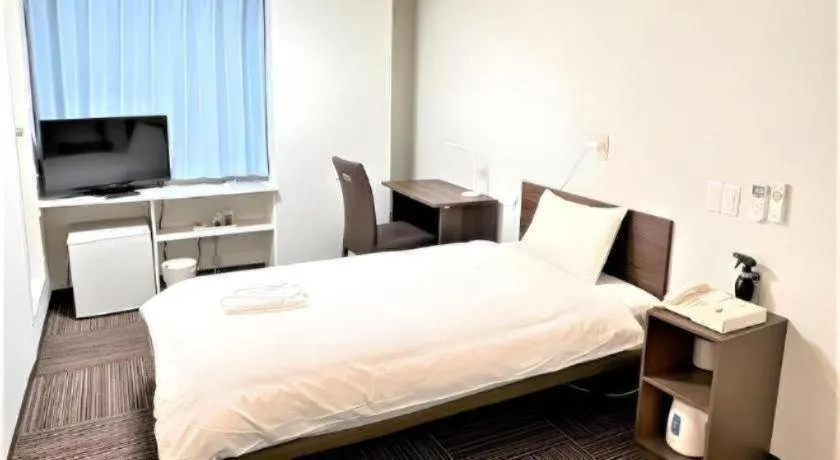 Bed in Ikebukuro Royal Hotel Higashiguchi