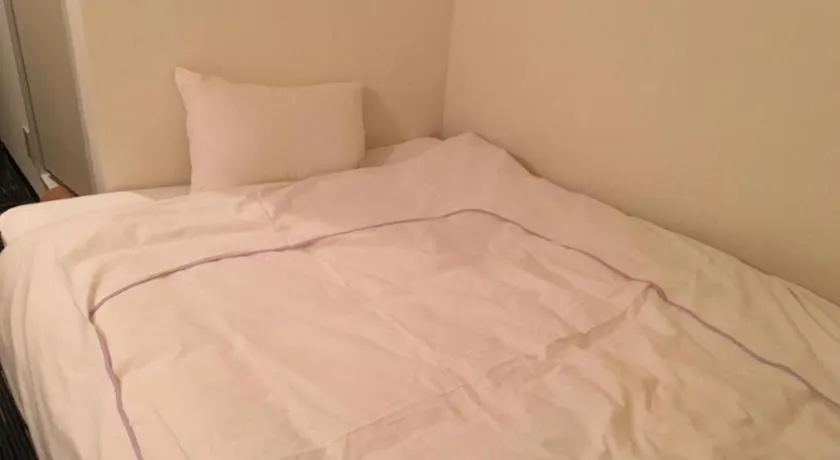 Bed in Ikebukuro Royal Hotel Higashiguchi