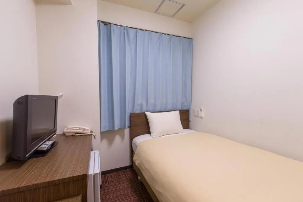 Bed in Ikebukuro Royal Hotel Higashiguchi