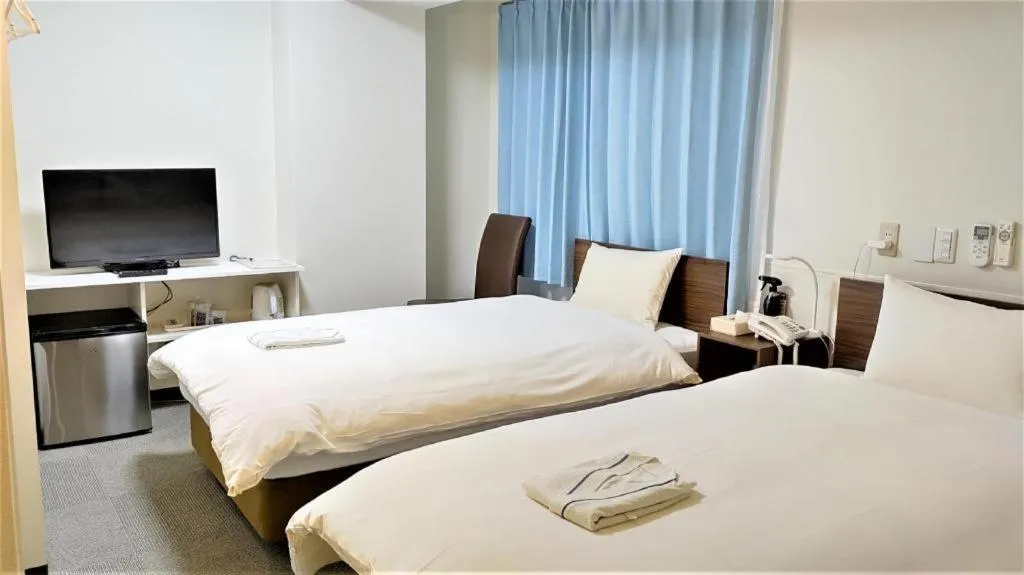 Bed in Ikebukuro Royal Hotel Higashiguchi