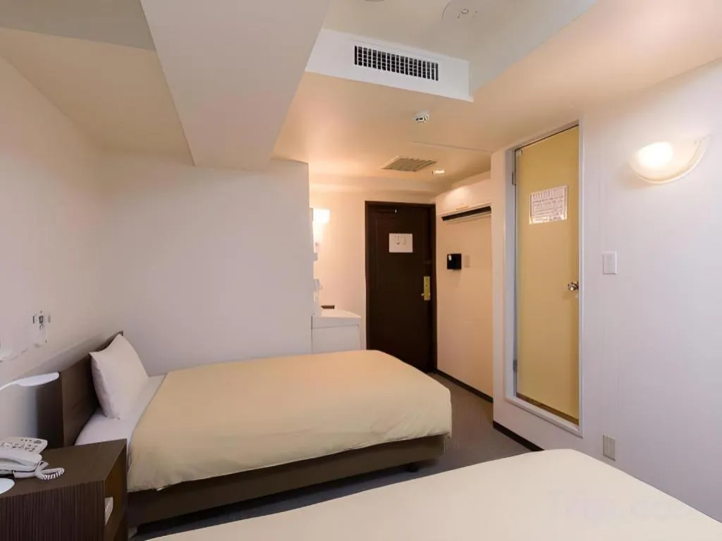 Bed in Ikebukuro Royal Hotel Higashiguchi