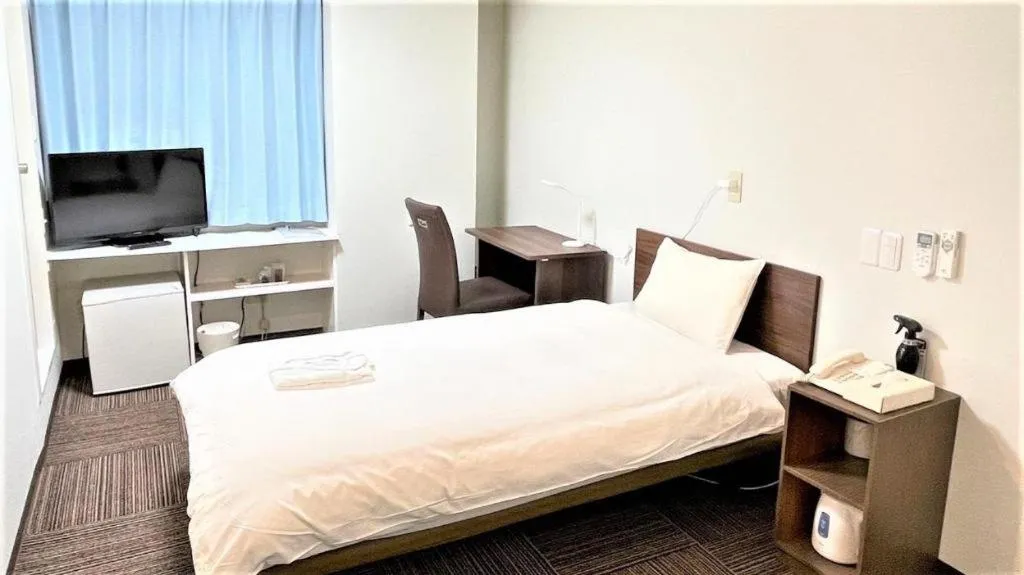 Bed in Ikebukuro Royal Hotel Higashiguchi