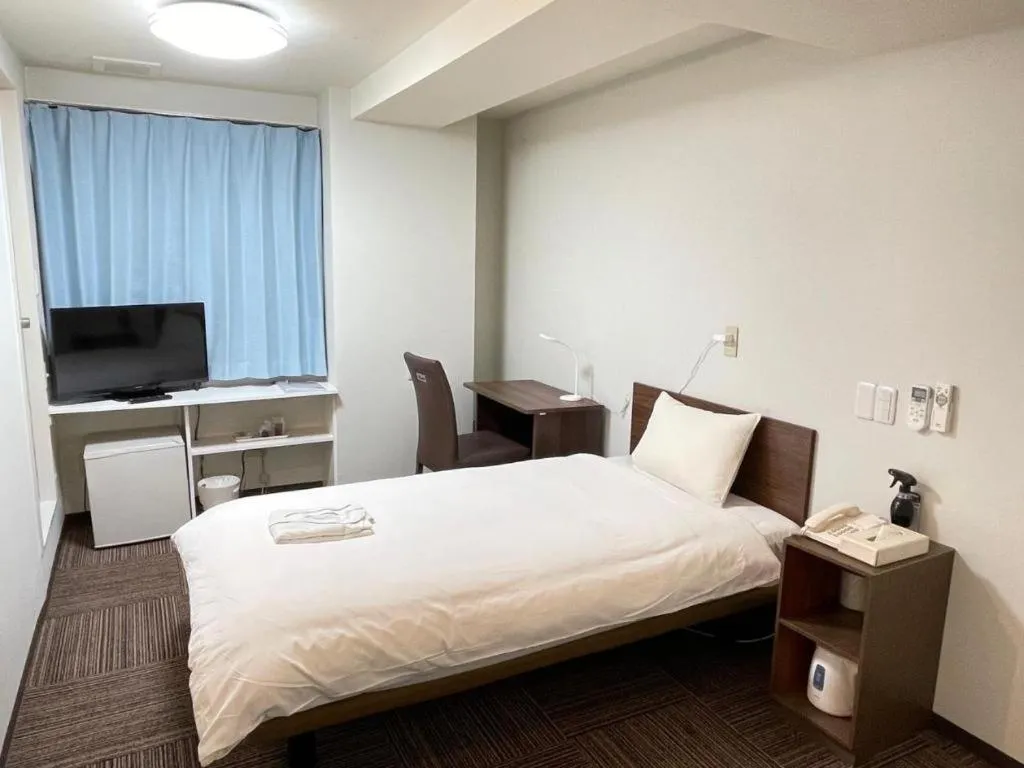 Bed in Ikebukuro Royal Hotel Higashiguchi