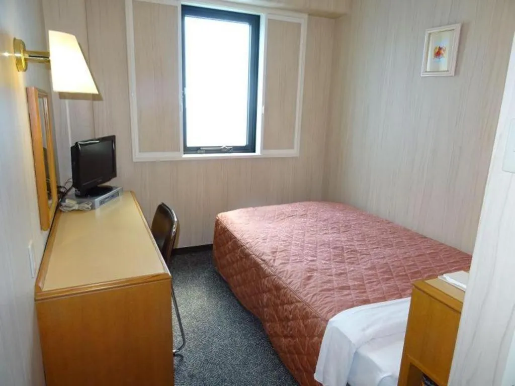 Bed in Kawasaki Green Plaza Hotel