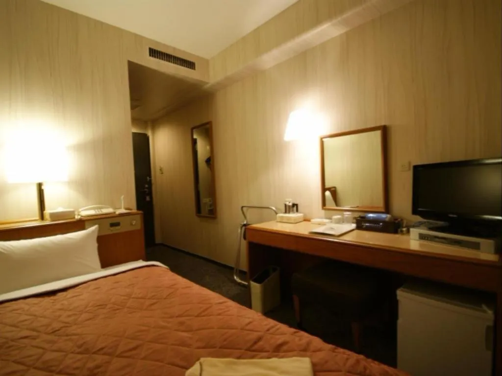 Bed in Kawasaki Green Plaza Hotel