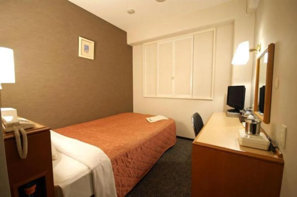 Bed in Kawasaki Green Plaza Hotel