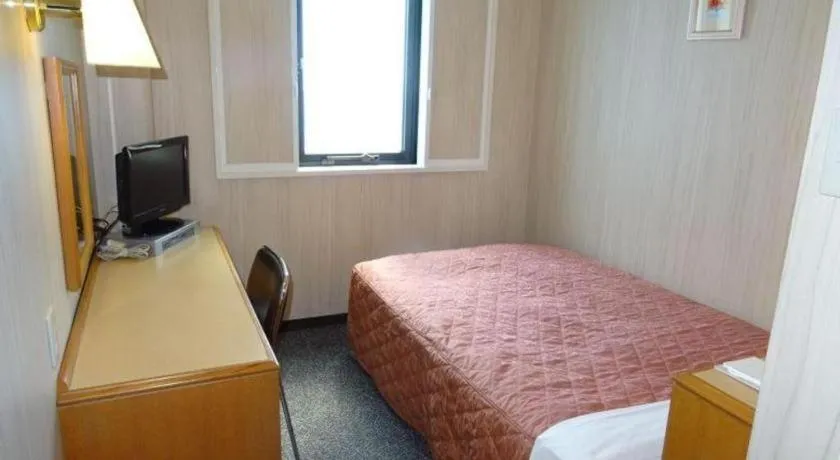 Bed in Kawasaki Green Plaza Hotel