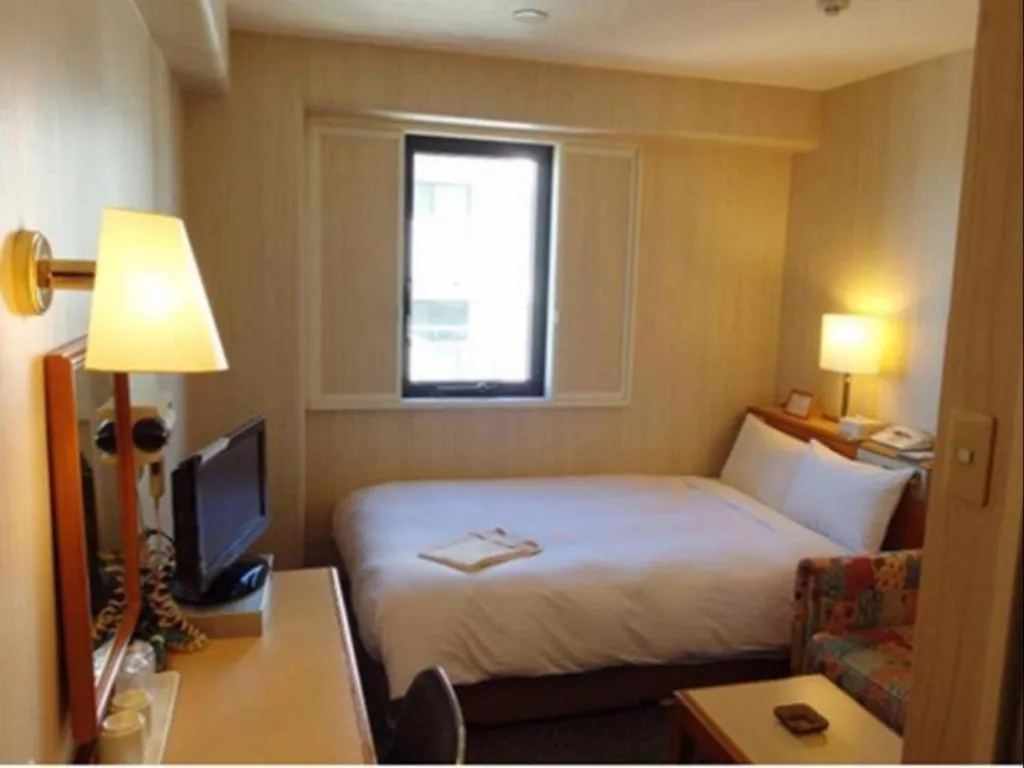 Bed in Kawasaki Green Plaza Hotel