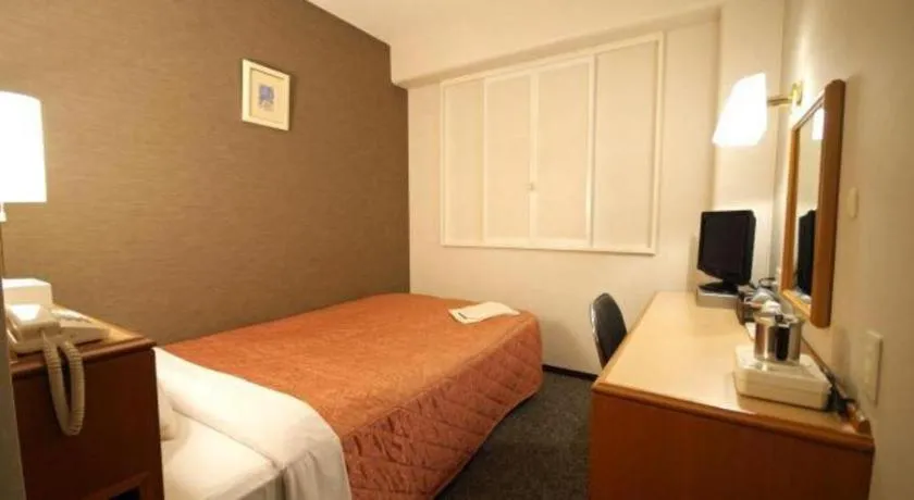 Bed in Kawasaki Green Plaza Hotel