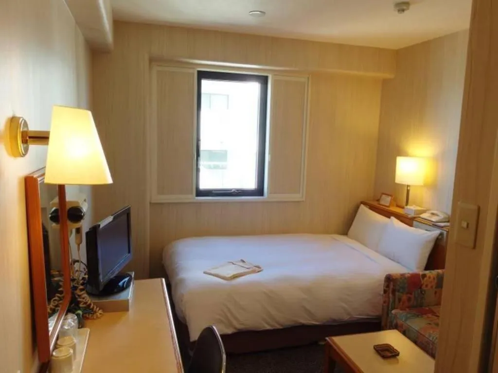 Bed in Kawasaki Green Plaza Hotel