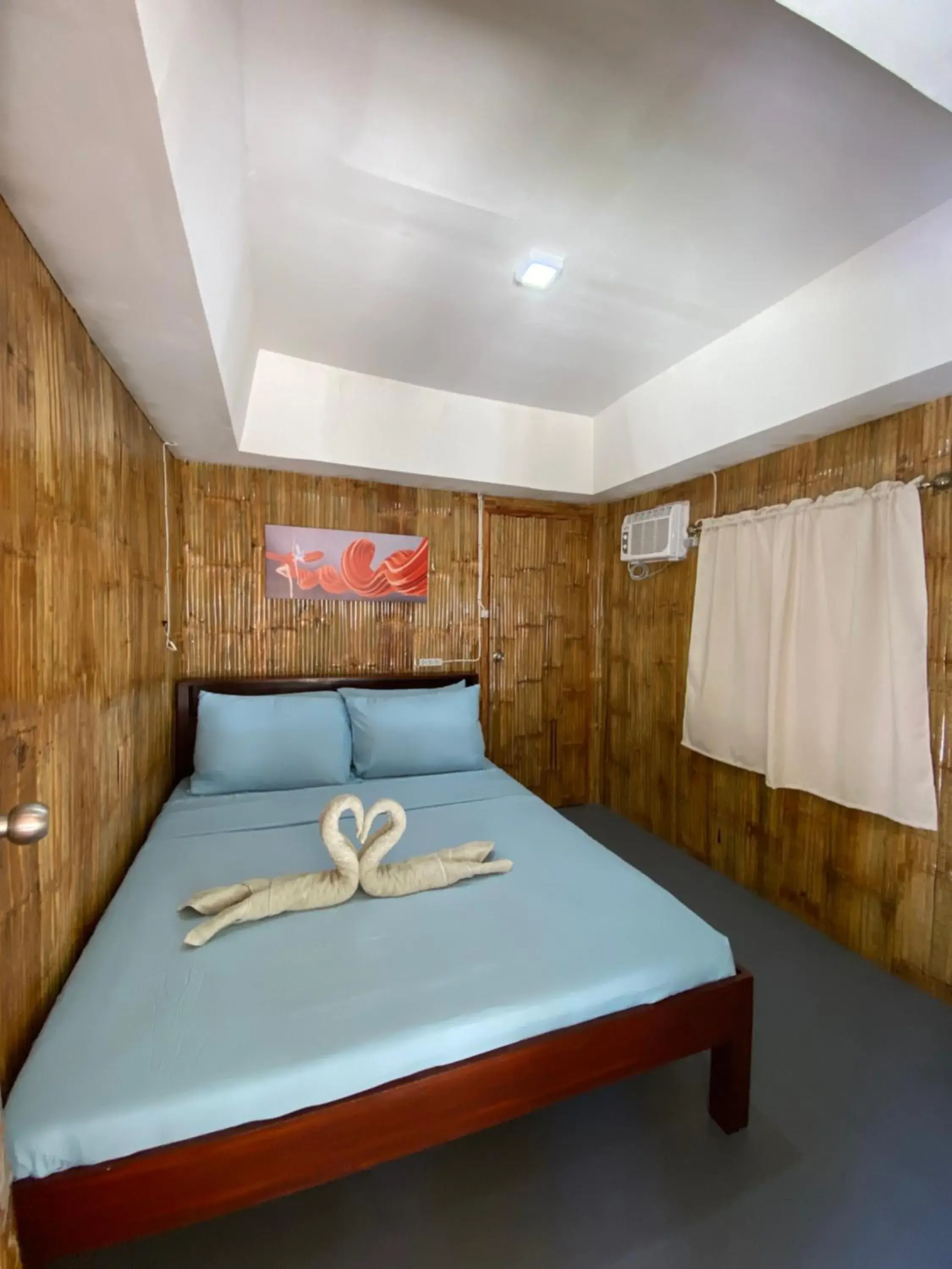 Bed in Moalboal Beach Front Hotel Bed in Moalboal Beach Front Hotel