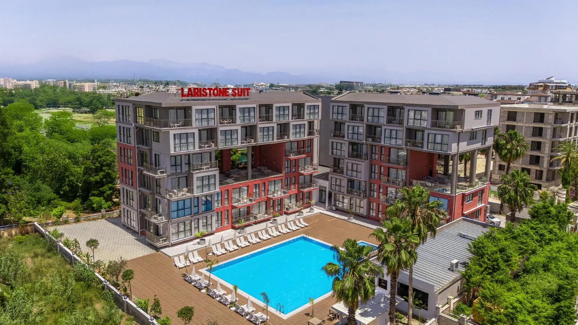 Property building in Evin Park Suit Lara & Spa