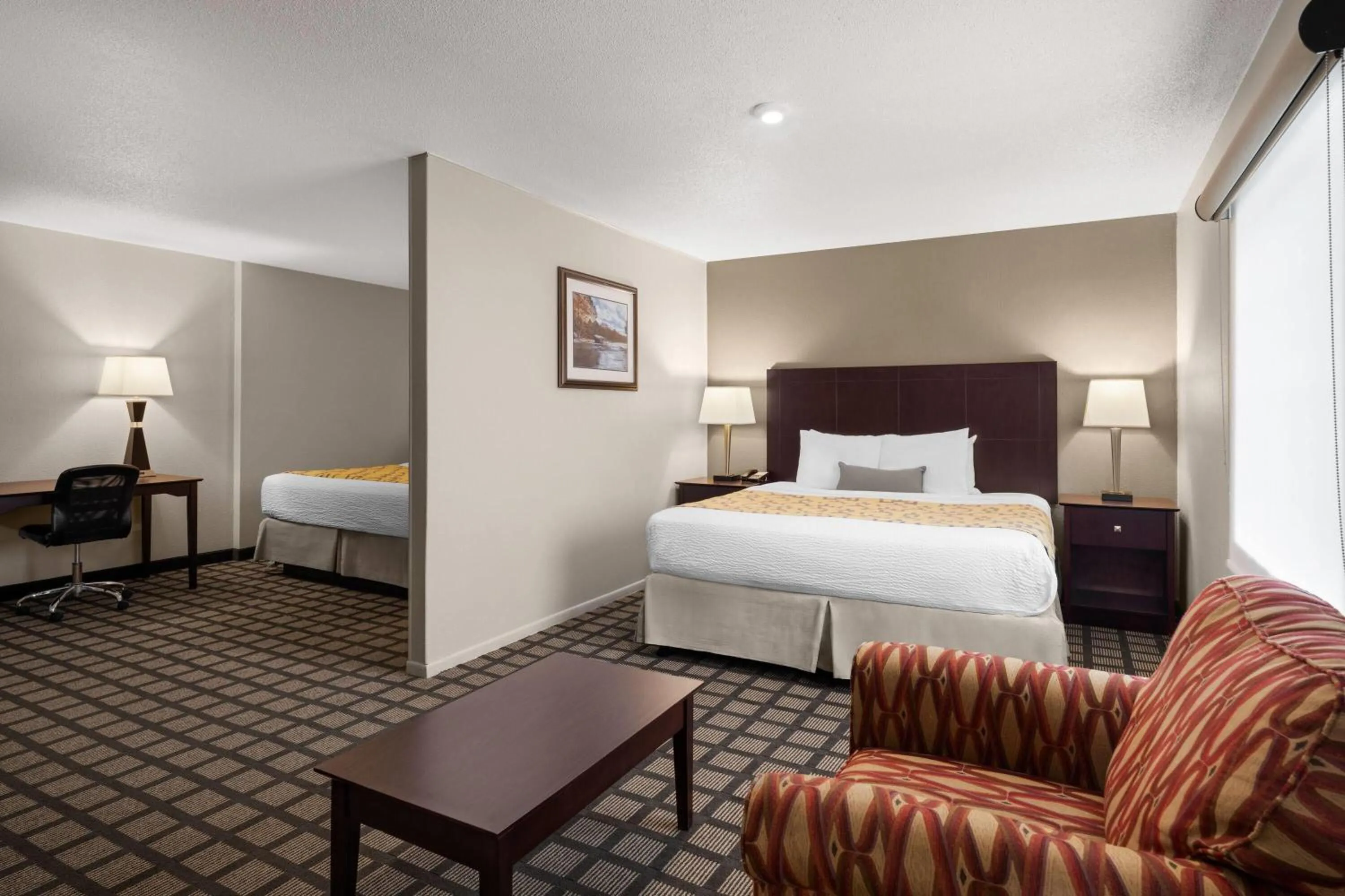 Photo of the whole room, Bed in Baymont by Wyndham Jefferson City