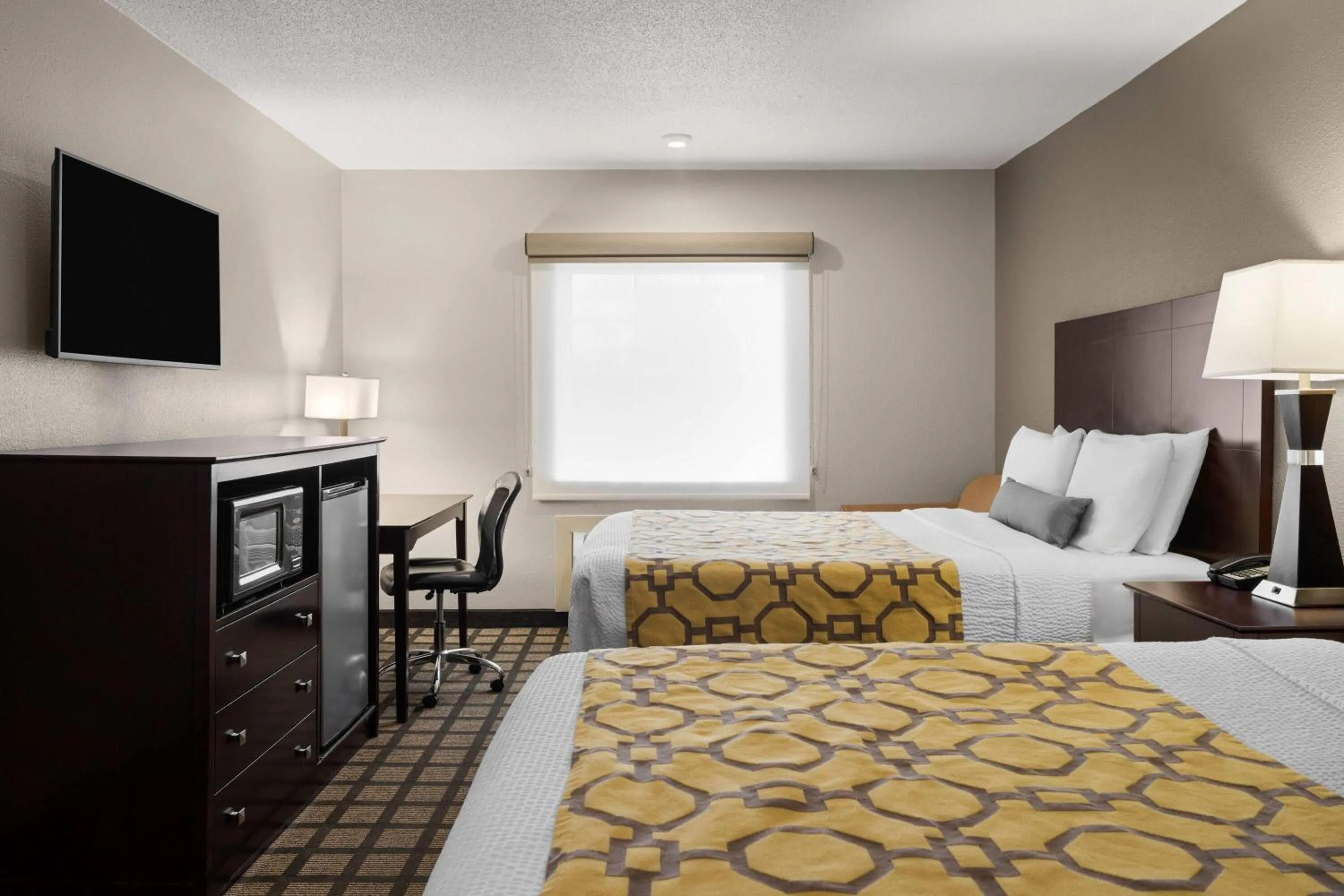 Photo of the whole room, Bed in Baymont by Wyndham Jefferson City