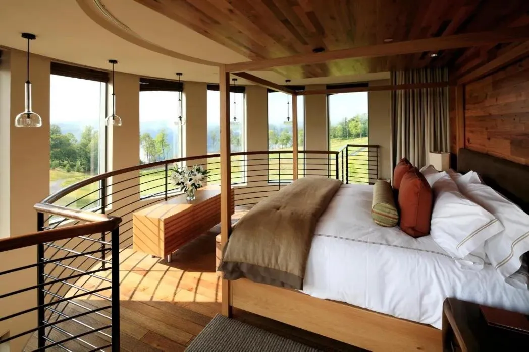 Bed in The Lodge at Primland, Auberge Collection