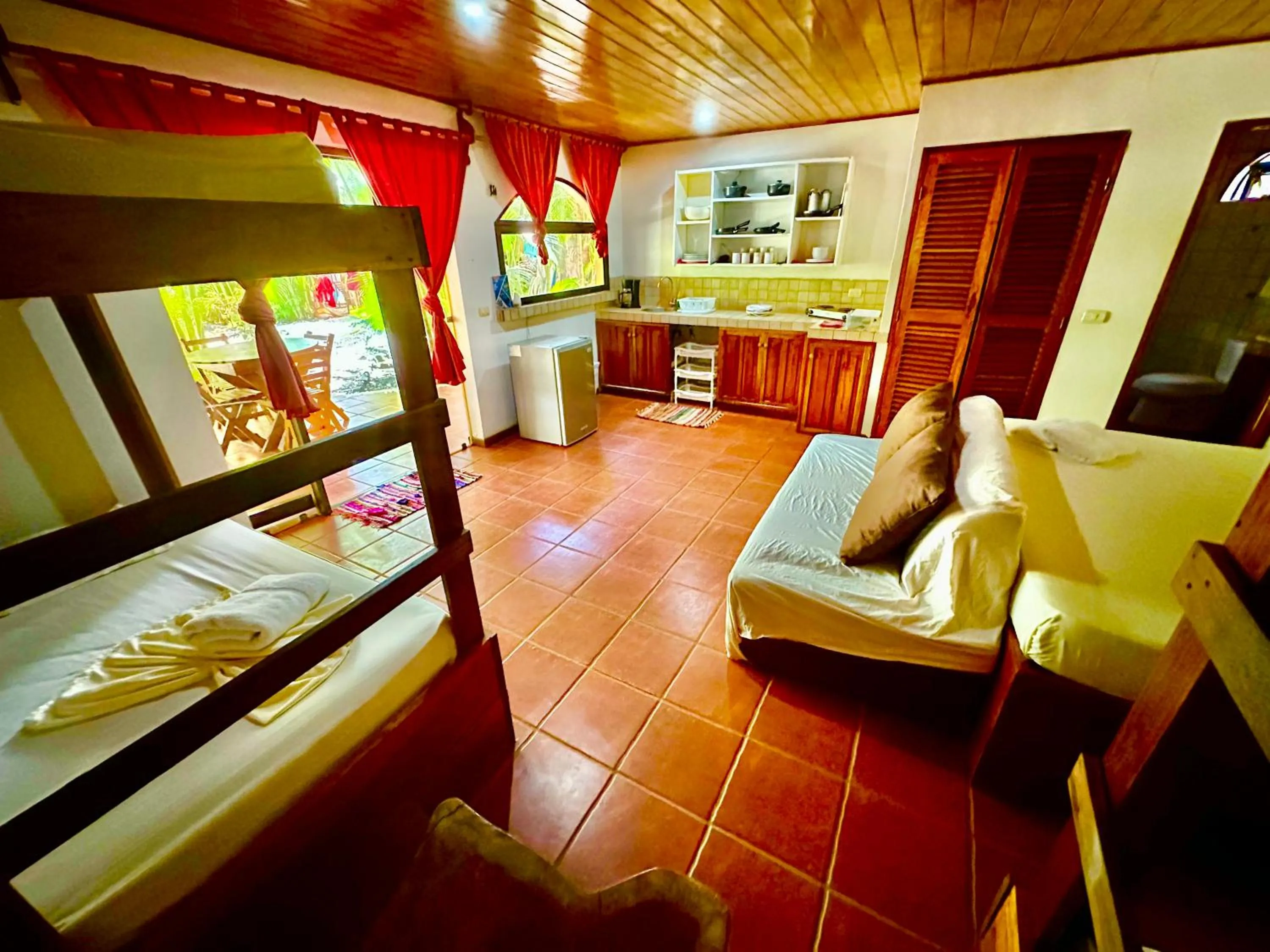 Photo of the whole room, Bed in Pacifica Surf Studios