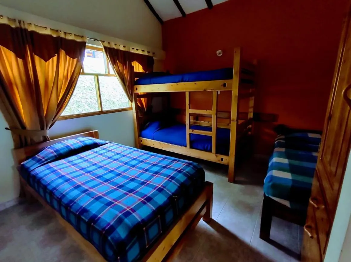 Bed in Hotel Cabañas San Cayetano